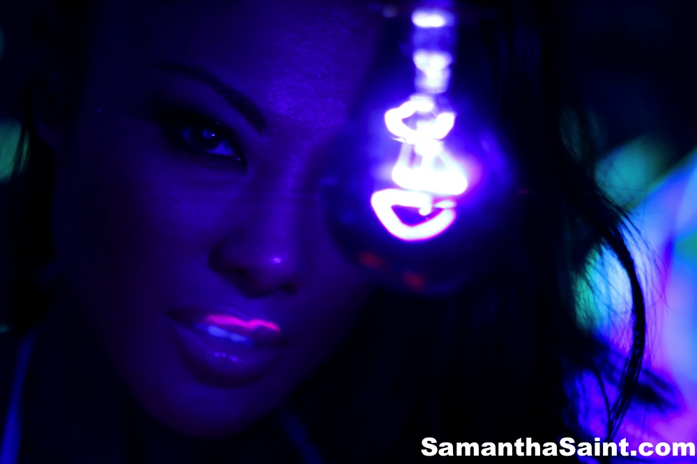 Samantha Saint and her lesbian girlfriend show pretty faces in black light  